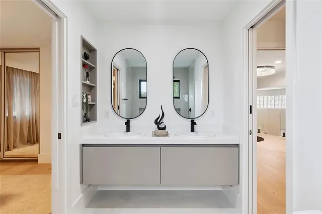 a view of a house with swimming pool and sitting area