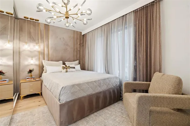 a view of a brick house with a yard