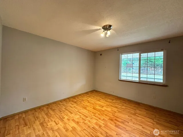 a bathroom with a mirror and a shower