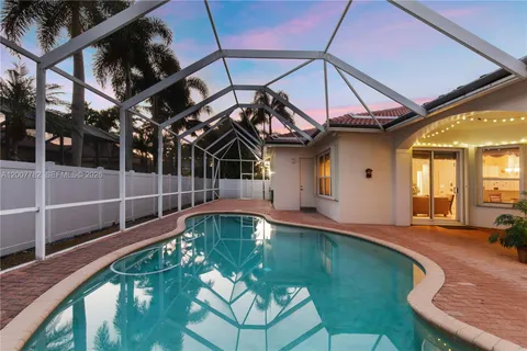 a swimming pool with a outdoor seating