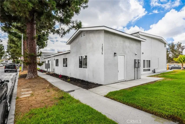 a house view with a backyard