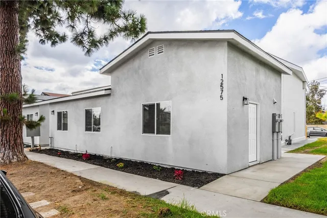 a house view with a backyard space