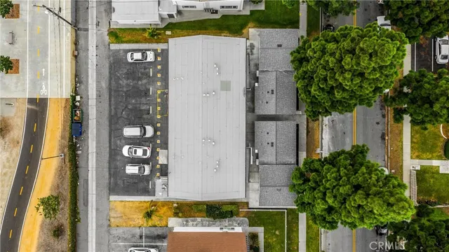 an aerial view of a house with outdoor space