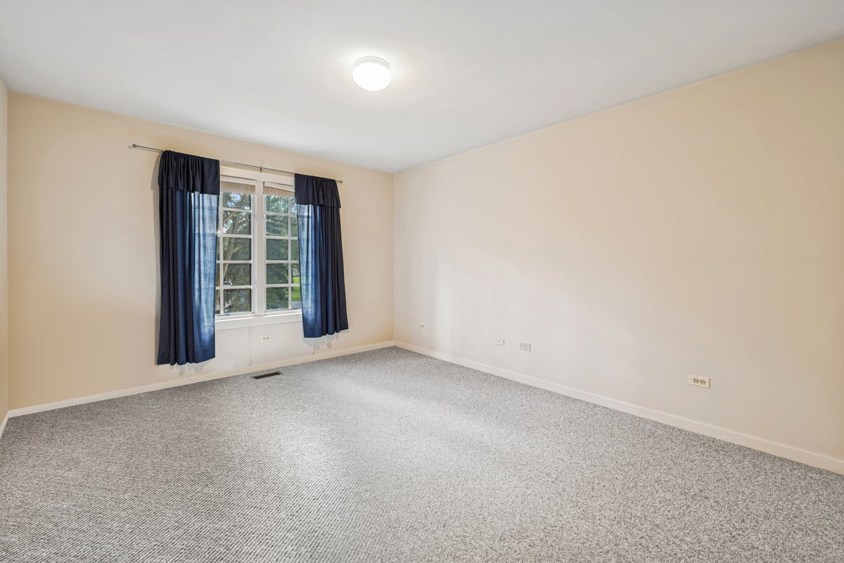 5116 Bonnie Brae Road Richmond, IL 60071 - Photo 16 of 27 an empty room with windows