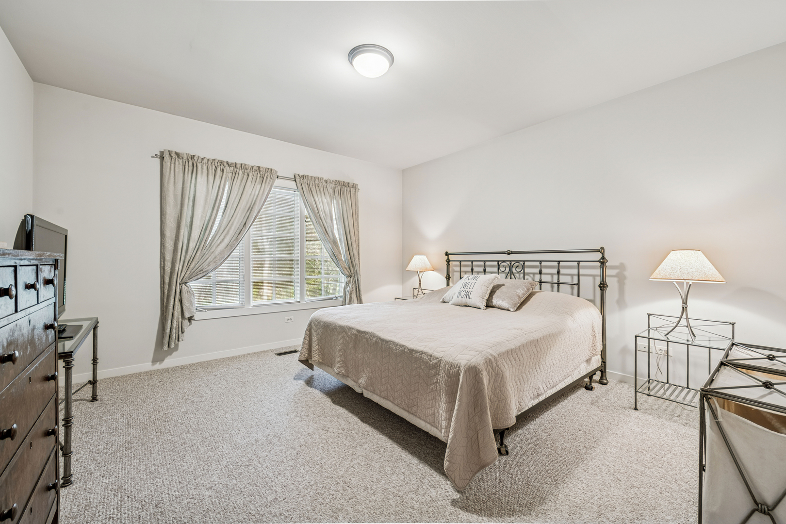 5116 Bonnie Brae Road Richmond, IL 60071 - Photo 10 of 27 a bedroom with a bed and a window