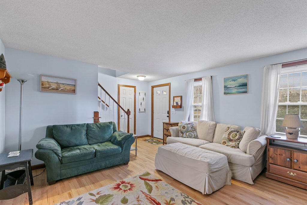 50 Circle Drive Hyannis, MA 02601 - Photo 14 of 32 a living room with furniture and a couch