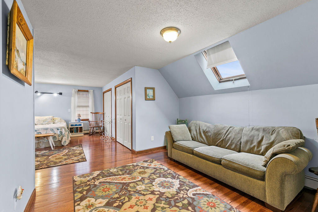 50 Circle Drive Hyannis, MA 02601 - Photo 16 of 32 a living room with furniture and a couch