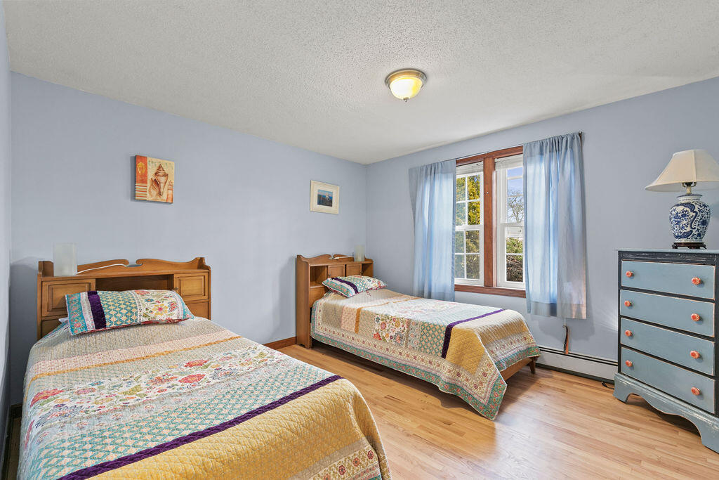 50 Circle Drive Hyannis, MA 02601 - Photo 22 of 32 a bedroom with two beds and a window