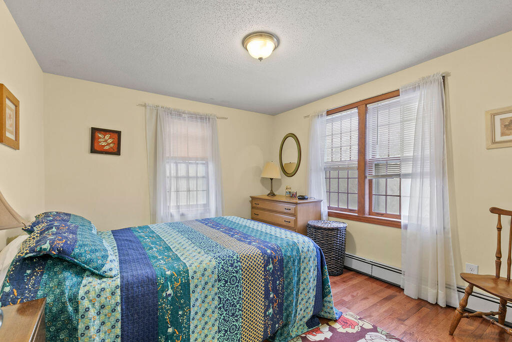 50 Circle Drive Hyannis, MA 02601 - Photo 24 of 32 a bedroom with a bed and window