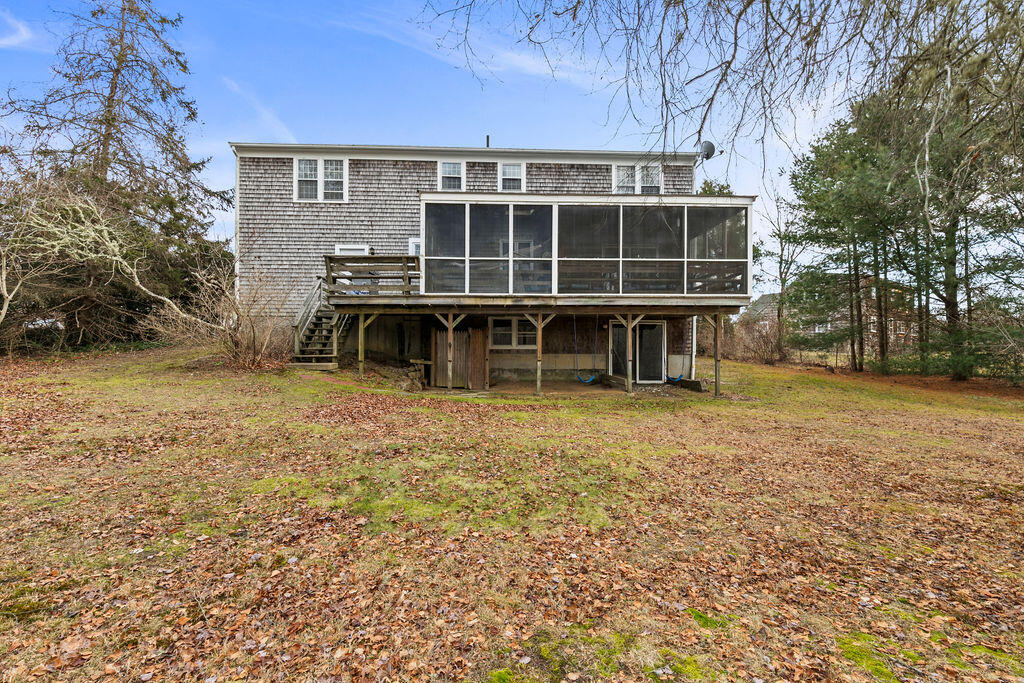50 Circle Drive Hyannis, MA 02601 - Photo 7 of 32 a front view of a house with a yard