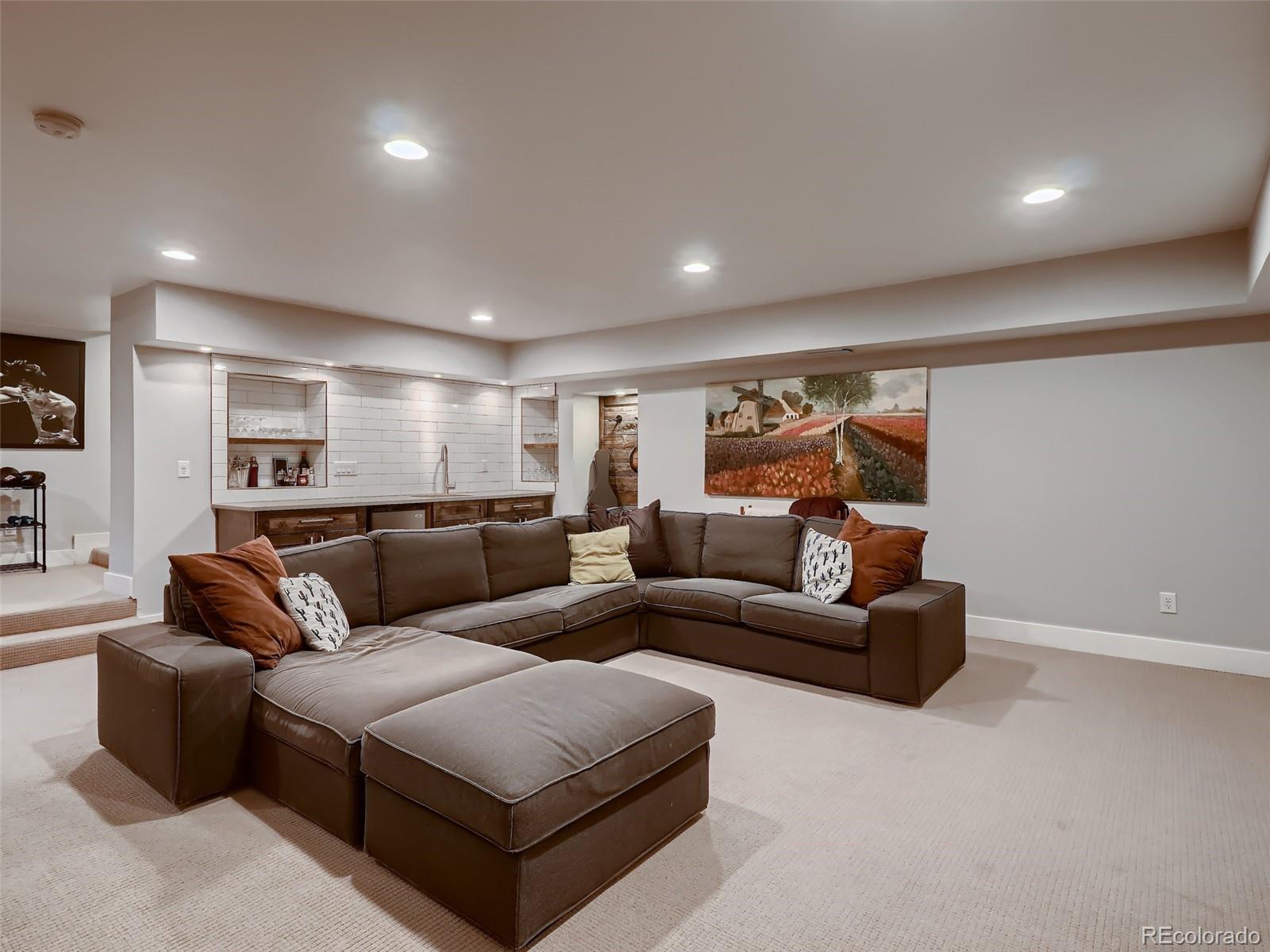 3548 Decatur Street Denver, CO 80211 - Photo 25 of 40 a living room with furniture and a couch
