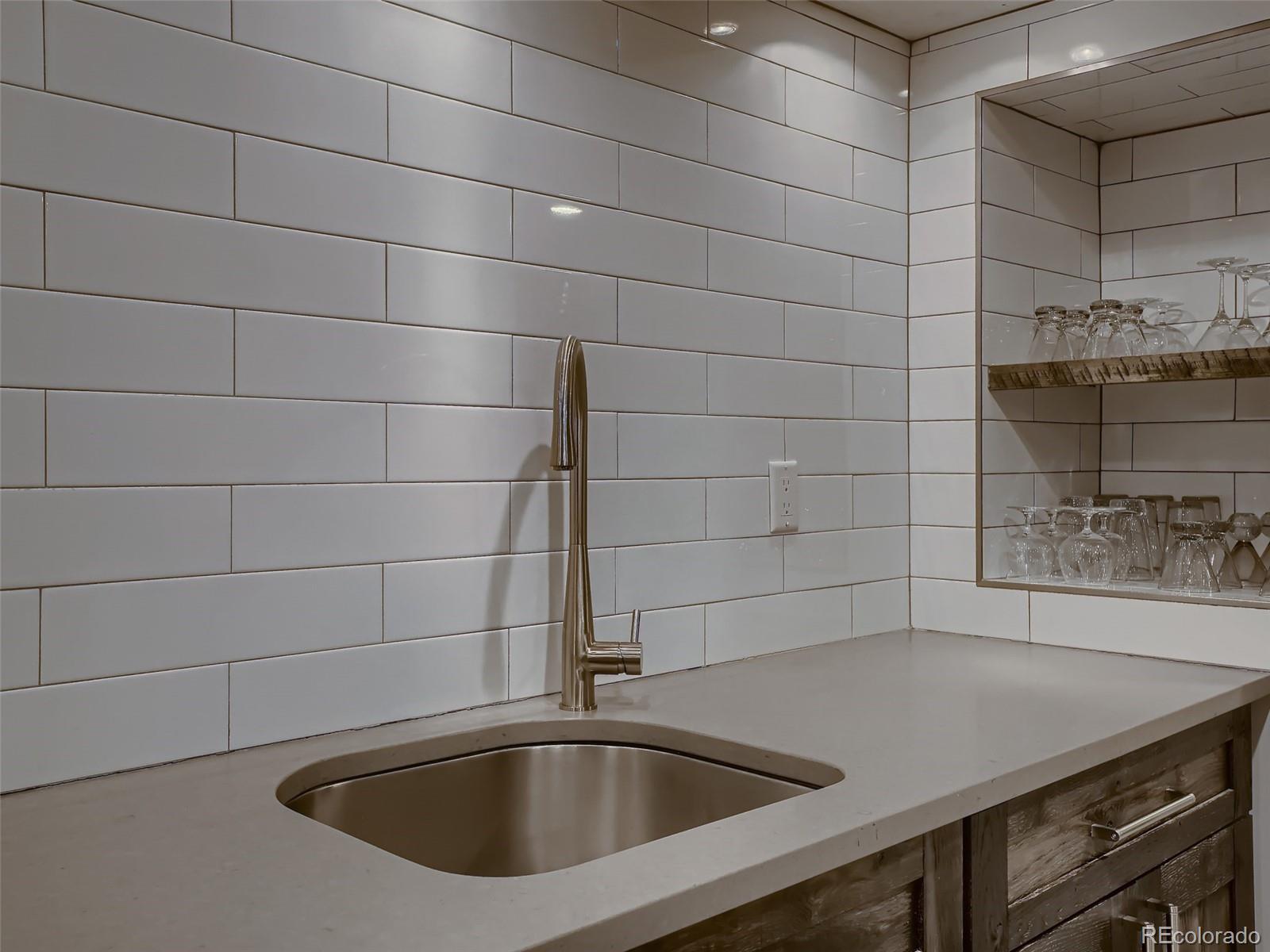 3548 Decatur Street Denver, CO 80211 - Photo 29 of 40 a bathroom with a sink and tub