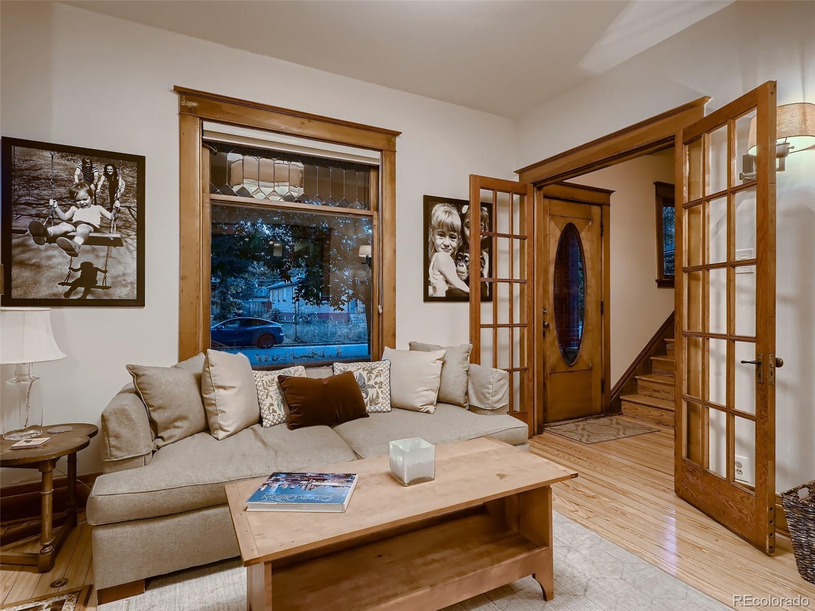 3548 Decatur Street Denver, CO 80211 - Photo 7 of 40 a living room with furniture and a window
