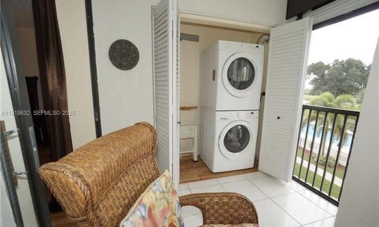 3521 Environ Boulevard, Unit B308 Lauderhill, FL 33319 - Photo 4 of 15 a utility room with dryer and washer