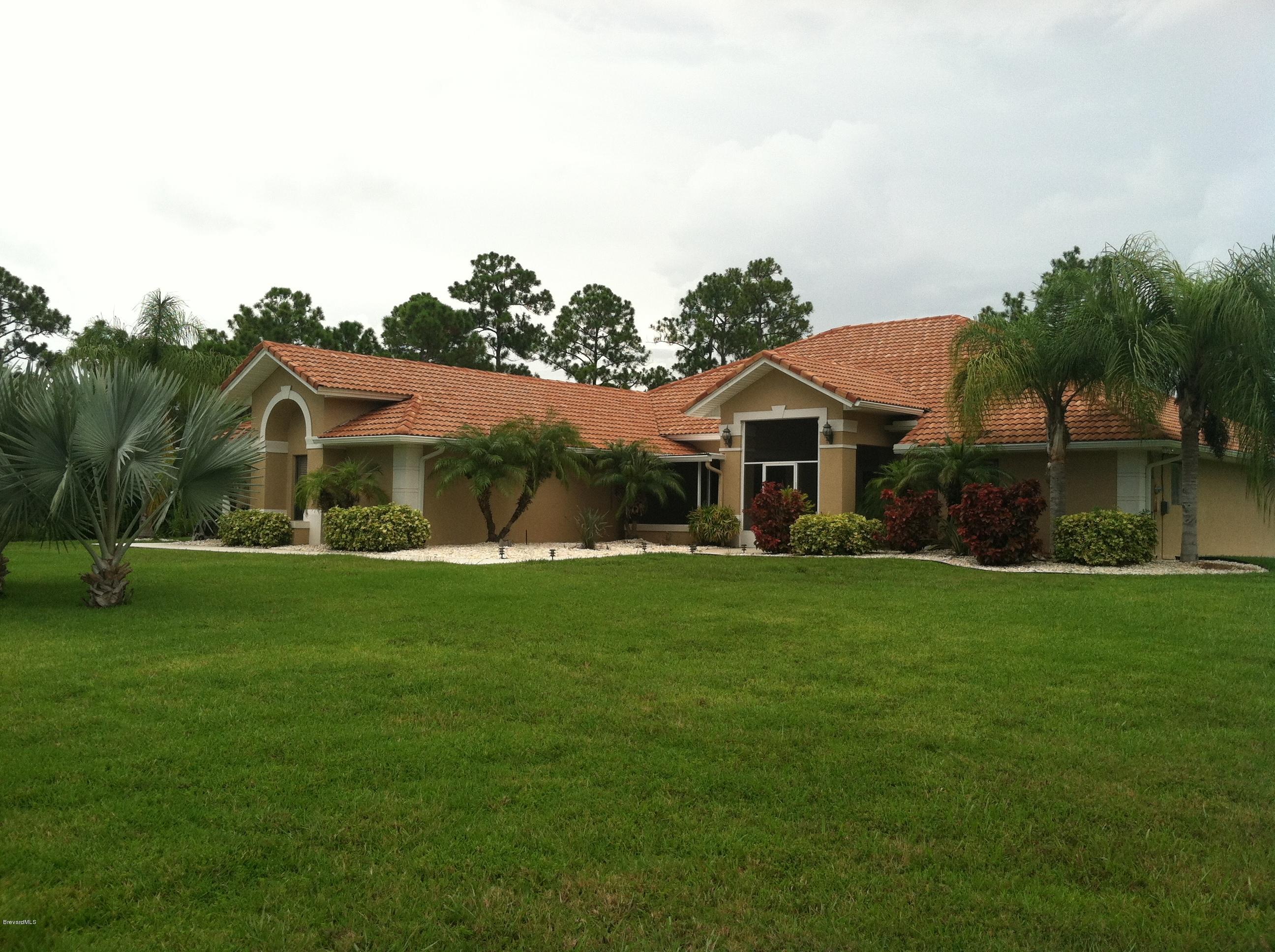 1965 Grant Road Grant Valkaria, FL 32949 - Photo 22 of 22 Front with lush landscaping