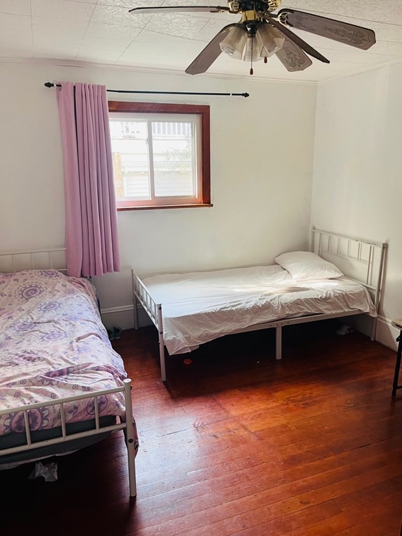 53 Hillside Avenue Everett, MA 02149 - Photo 10 of 11 a bedroom with bed and a window