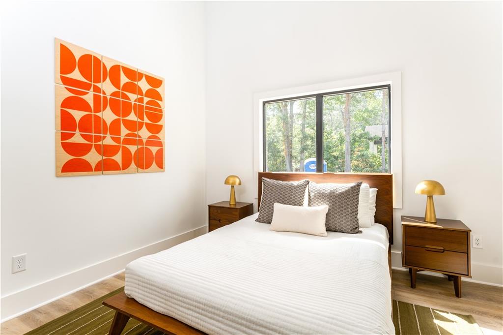 1160 Gracewood Avenue Southeast, Unit 111 Atlanta, GA 30316 - Photo 15 of 38 a bedroom with a bed and a window