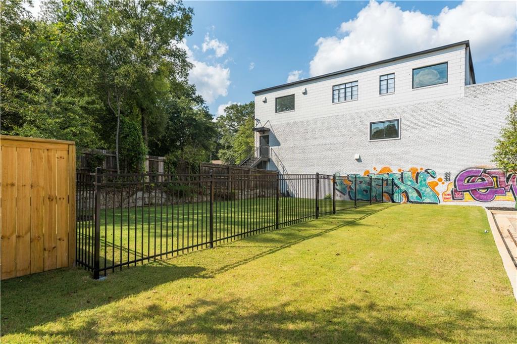 1160 Gracewood Avenue Southeast, Unit 111 Atlanta, GA 30316 - Photo 24 of 38 a view of back yard of the house