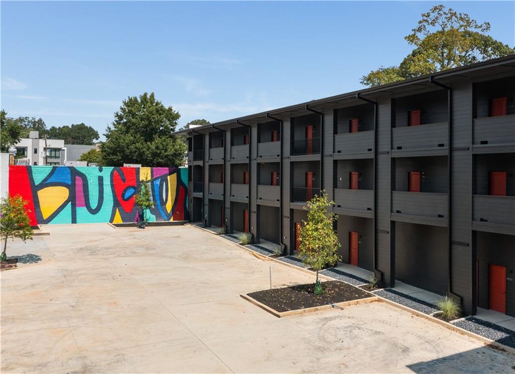 1160 Gracewood Avenue Southeast, Unit 111 Atlanta, GA 30316 - Photo 25 of 38 a view of entryway door with potted plants
