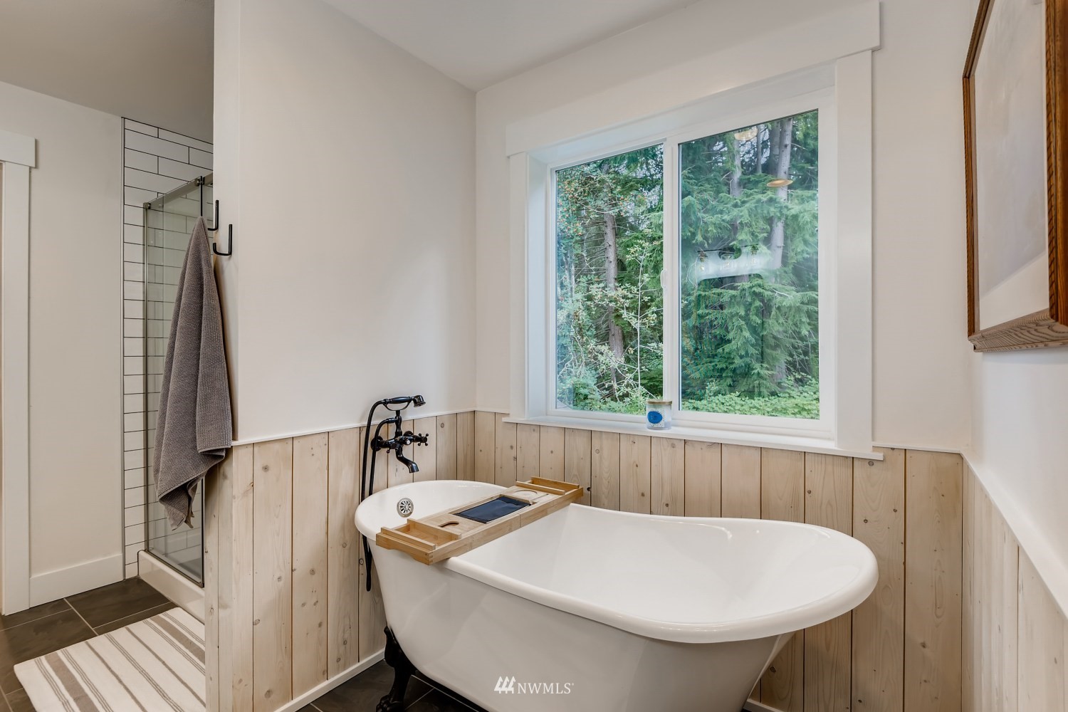 28313 Florence Acres Road Monroe, WA 98272 - Photo 14 of 27 a bathroom with a sink a toilet a mirror and tub