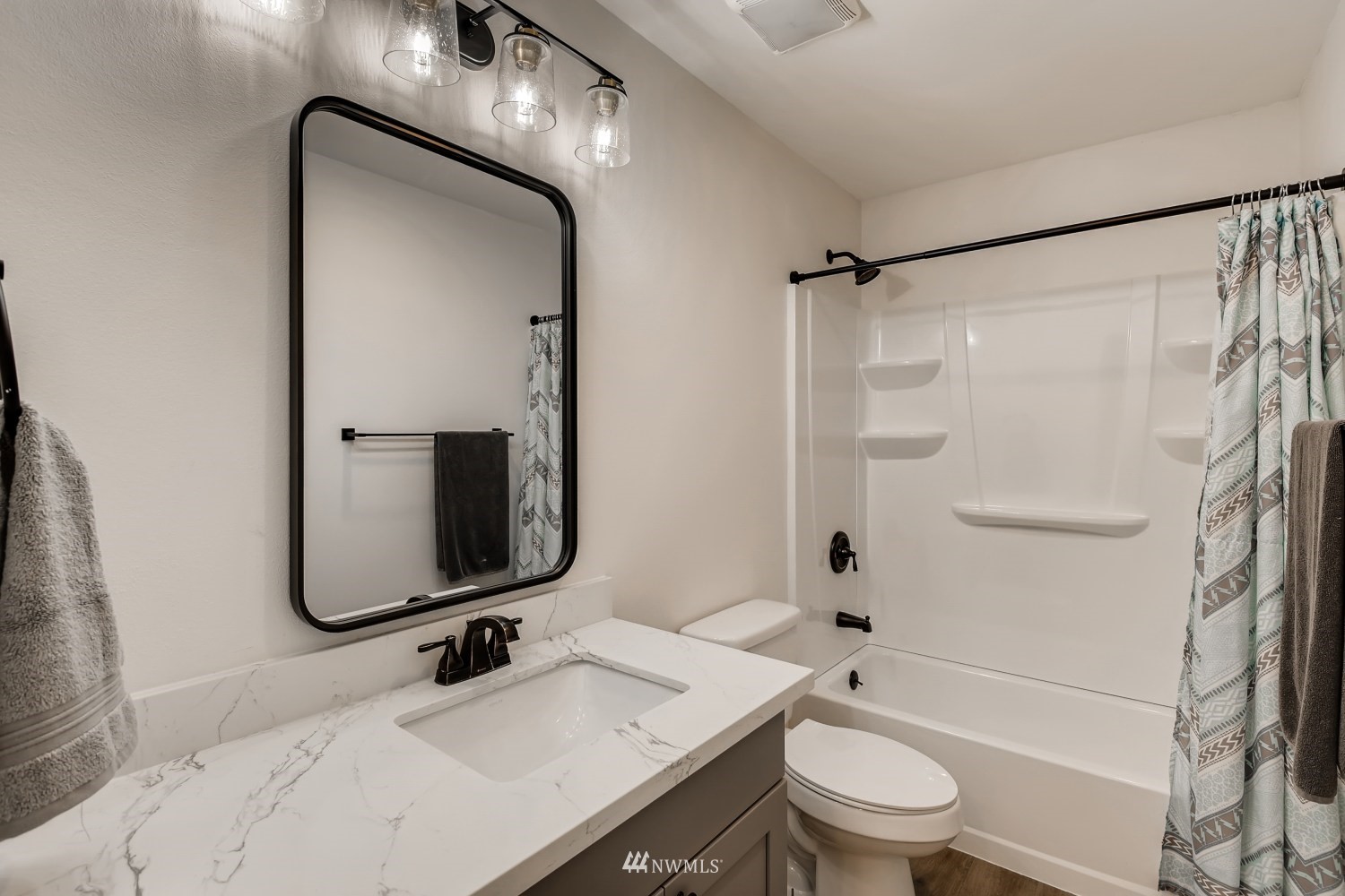 28313 Florence Acres Road Monroe, WA 98272 - Photo 17 of 27 a bathroom with a sink toilet and shower