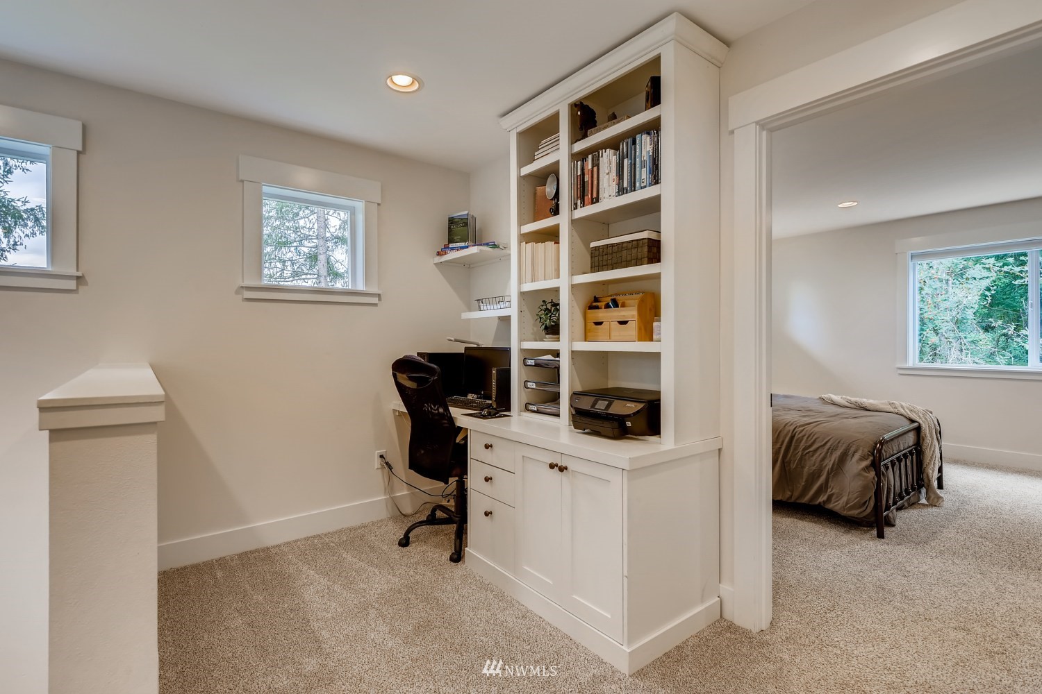 28313 Florence Acres Road Monroe, WA 98272 - Photo 19 of 27 a view of a workspace with furniture and a window