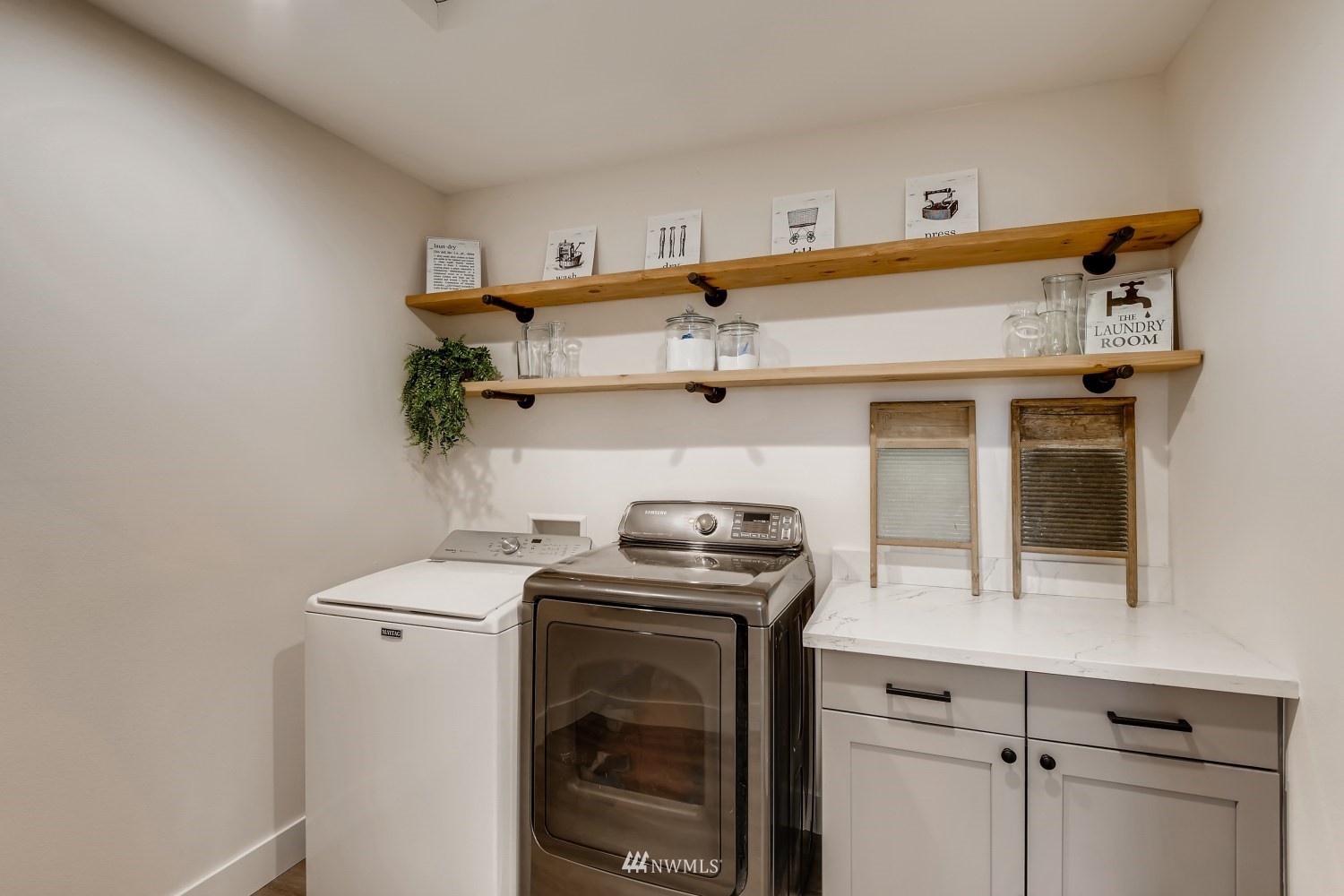 28313 Florence Acres Road Monroe, WA 98272 - Photo 20 of 27 a utility room with dryer and washer