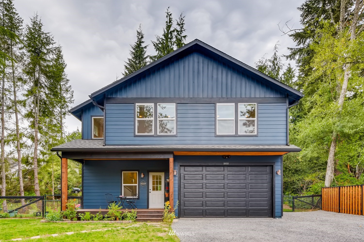 28313 Florence Acres Road Monroe, WA 98272 - Photo 2 of 27 a front view of a house with garden