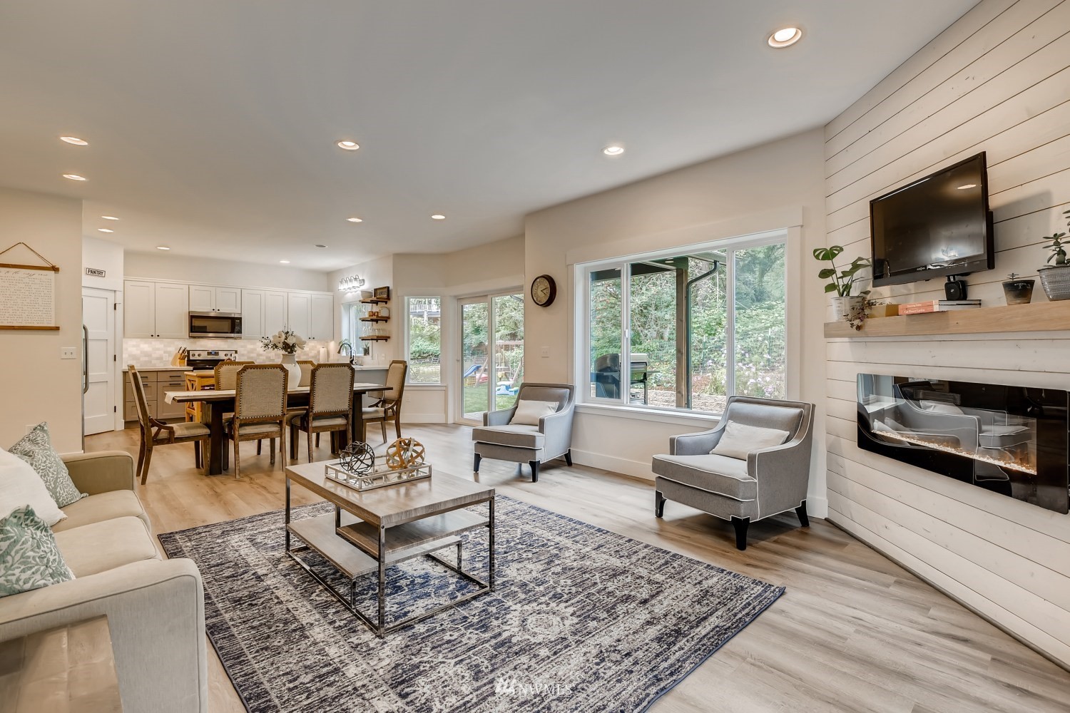 28313 Florence Acres Road Monroe, WA 98272 - Photo 5 of 27 a living room with furniture and a flat screen tv
