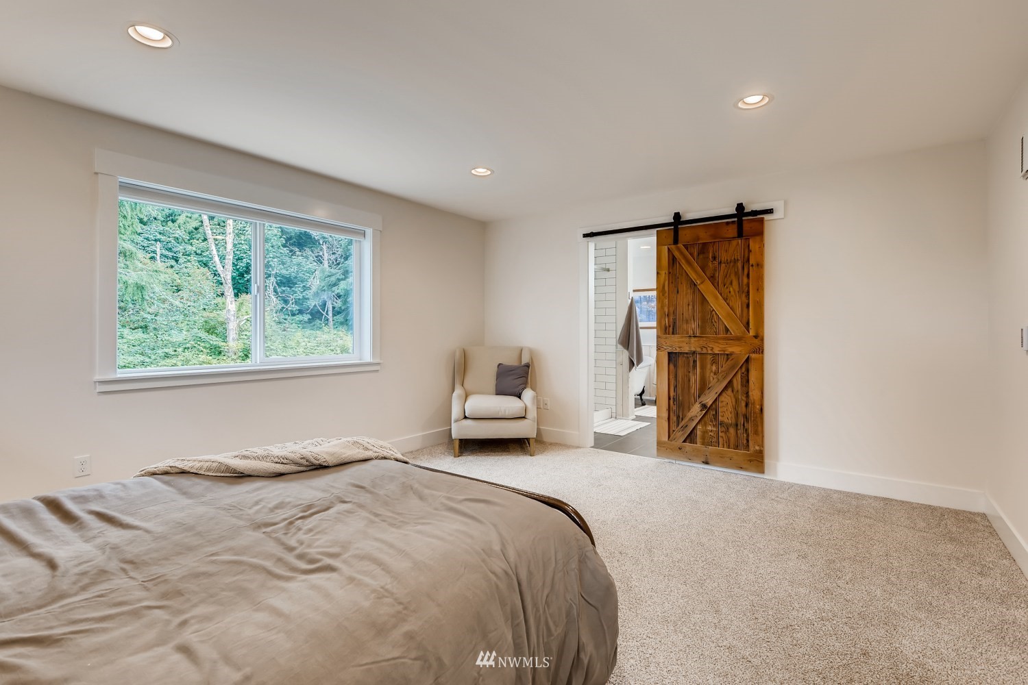 28313 Florence Acres Road Monroe, WA 98272 - Photo 10 of 27 a bedroom with a bed and a window