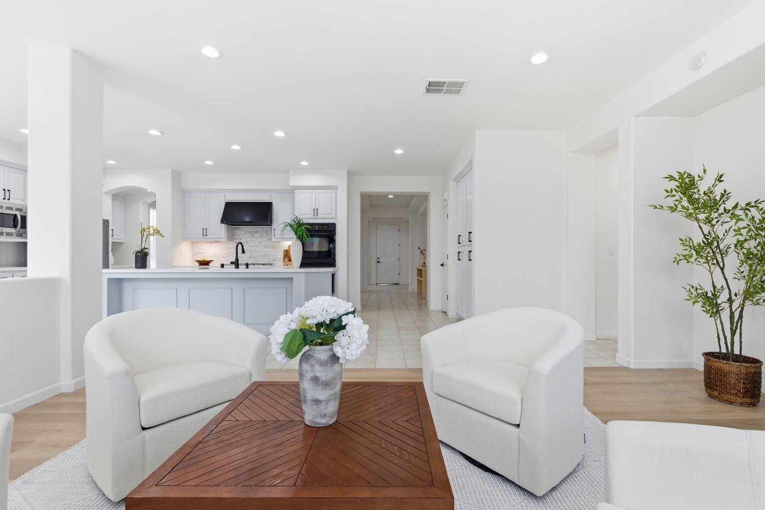 1012 Rock Harbor Point Hercules, CA 94547 - Photo 16 of 53 a living room with furniture potted plant and a window
