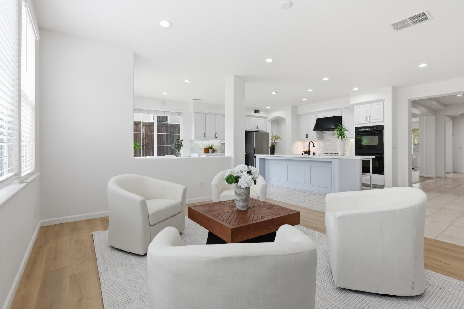1012 Rock Harbor Point Hercules, CA 94547 - Photo 17 of 53 a living room with furniture and kitchen area