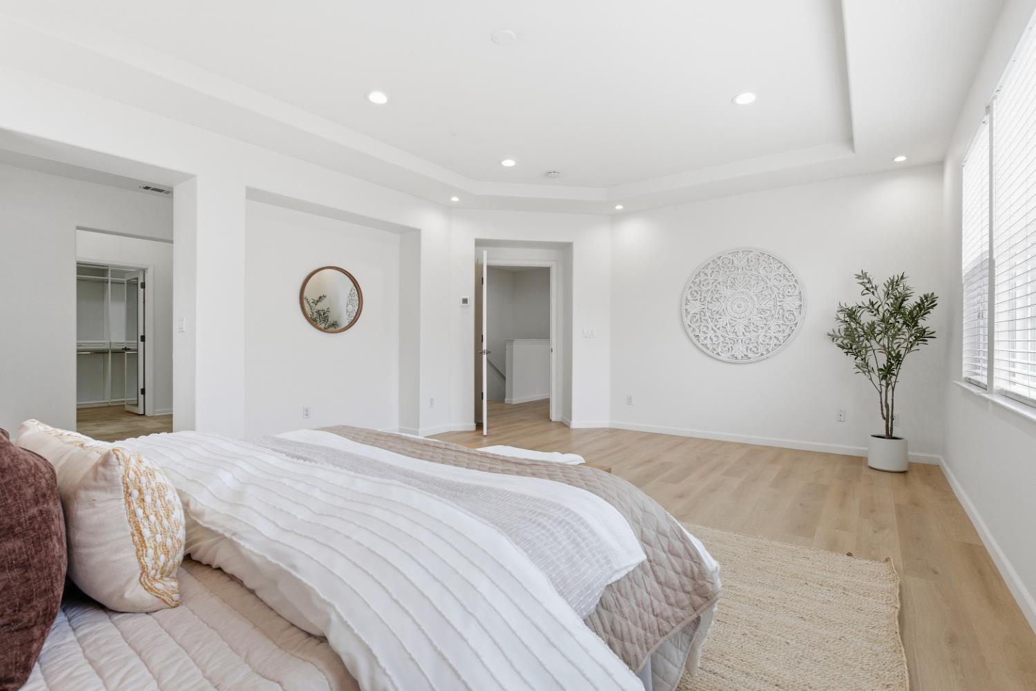 1012 Rock Harbor Point Hercules, CA 94547 - Photo 32 of 53 a bedroom with a bed and a chandelier