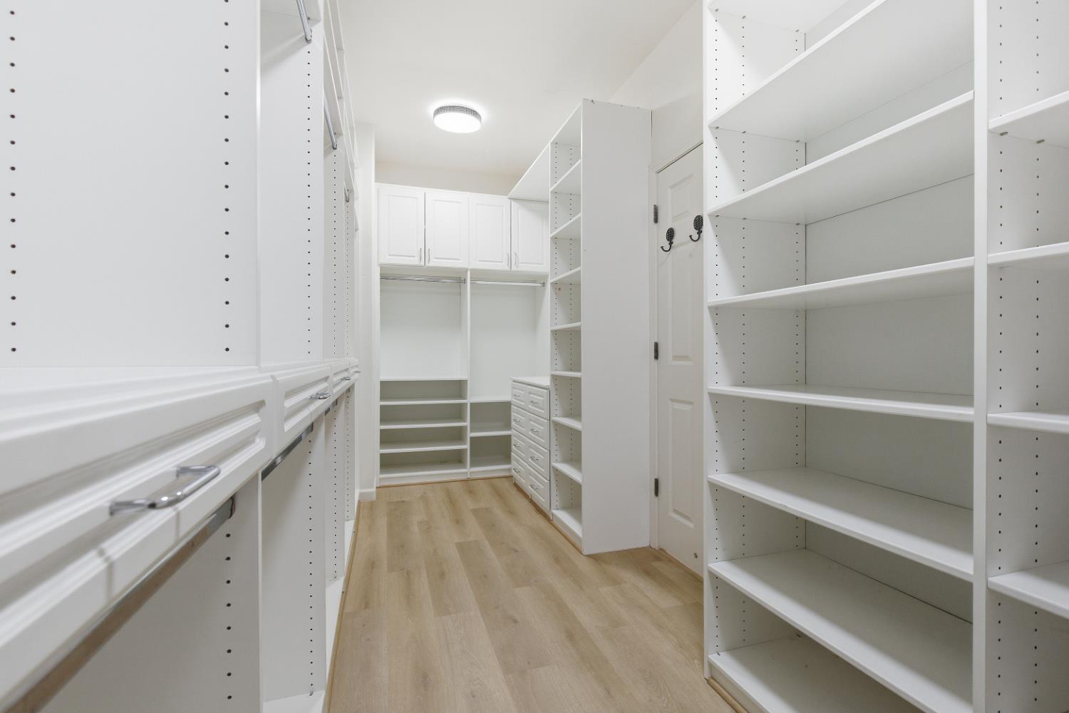 1012 Rock Harbor Point Hercules, CA 94547 - Photo 35 of 53 a kitchen with white cabinets and sink
