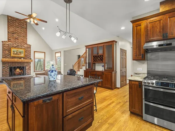 a bedroom with a large bed and a large window