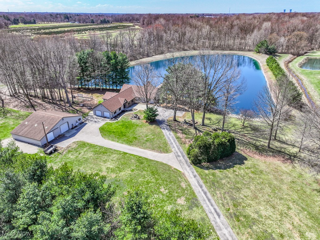 2866 South County Line Road Madison, OH 44057 - Photo 2 of 48 Birds eye view of property featuring a water view