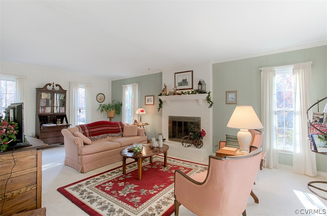 624 Fennimore Road Midlothian, VA 23114 - Photo 13 of 28 a living room with furniture and a fireplace