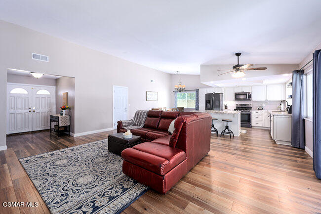 1097 Waltham Road Simi Valley, CA 93065 - Photo 8 of 37 a living room with furniture and a rug