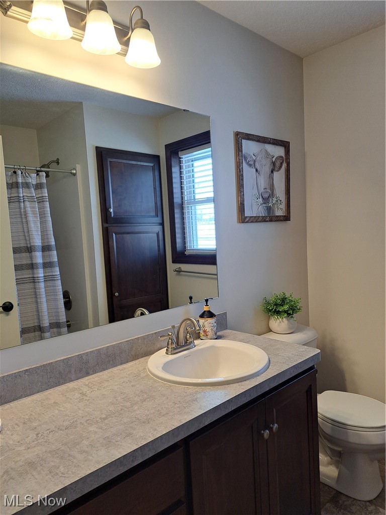 63877 Larrick Ridge Road Cambridge, OH 43725 - Photo 20 of 43 Bathroom with a shower and linen closet