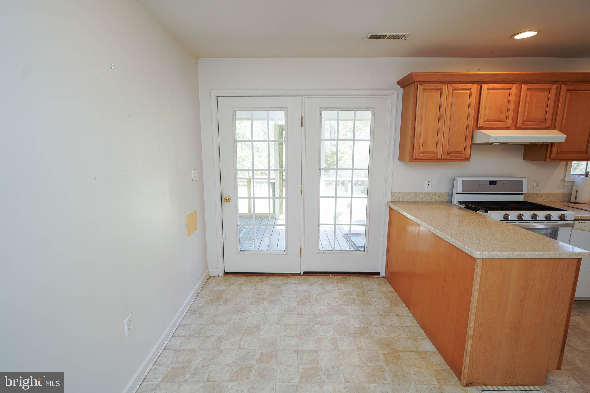 23290 Custom House Road Deal Island, MD 21821 - Photo 12 of 64 Rear entry to screened in porch