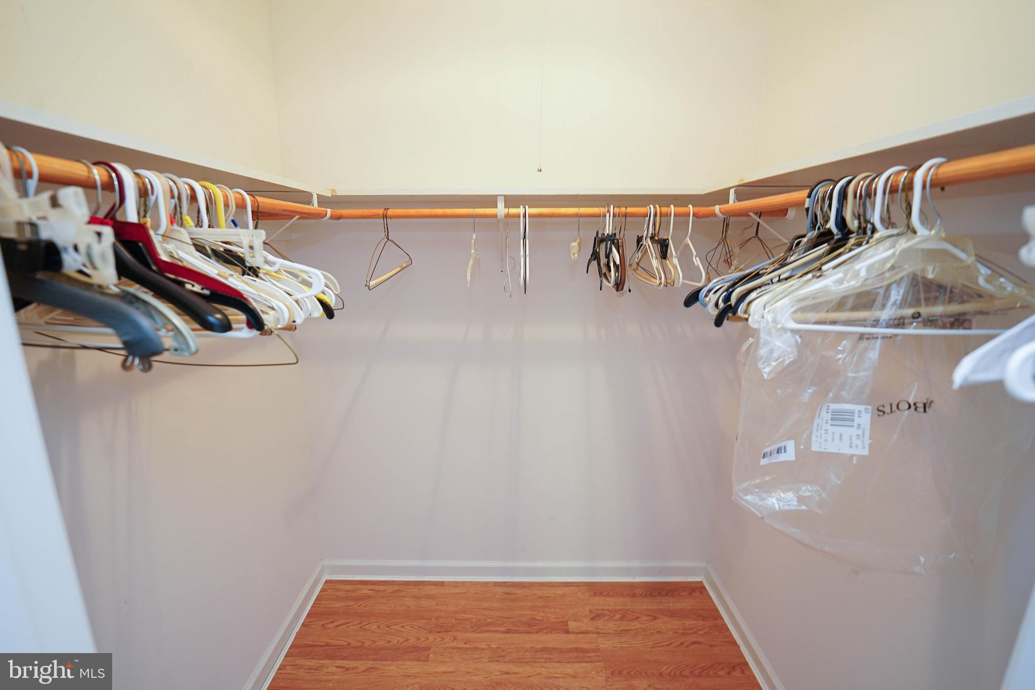 23290 Custom House Road Deal Island, MD 21821 - Photo 26 of 64 a view of walk in closet with clothes and shoes