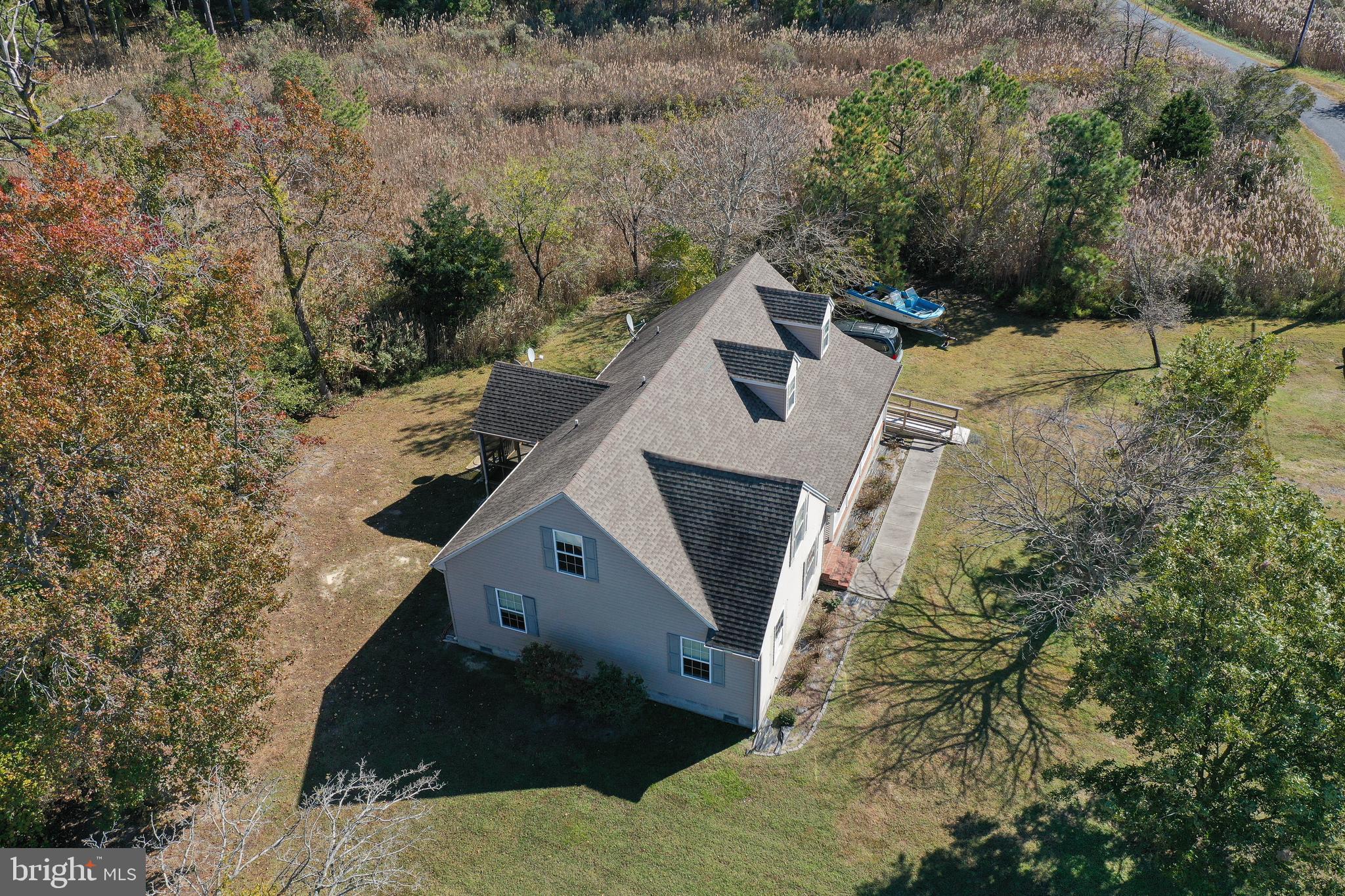 23290 Custom House Road Deal Island, MD 21821 - Photo 55 of 64 a view of a house with a yard