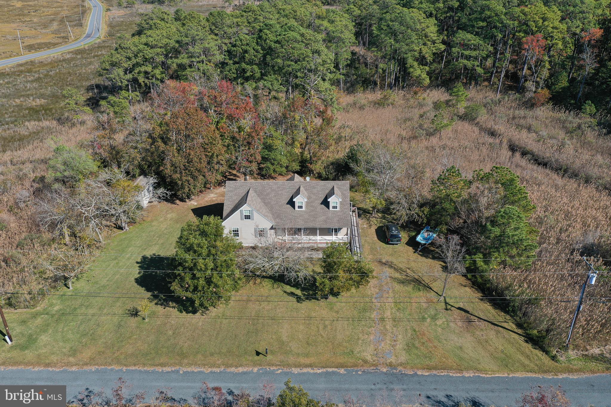 23290 Custom House Road Deal Island, MD 21821 - Photo 59 of 64 an aerial view of a house with a yard