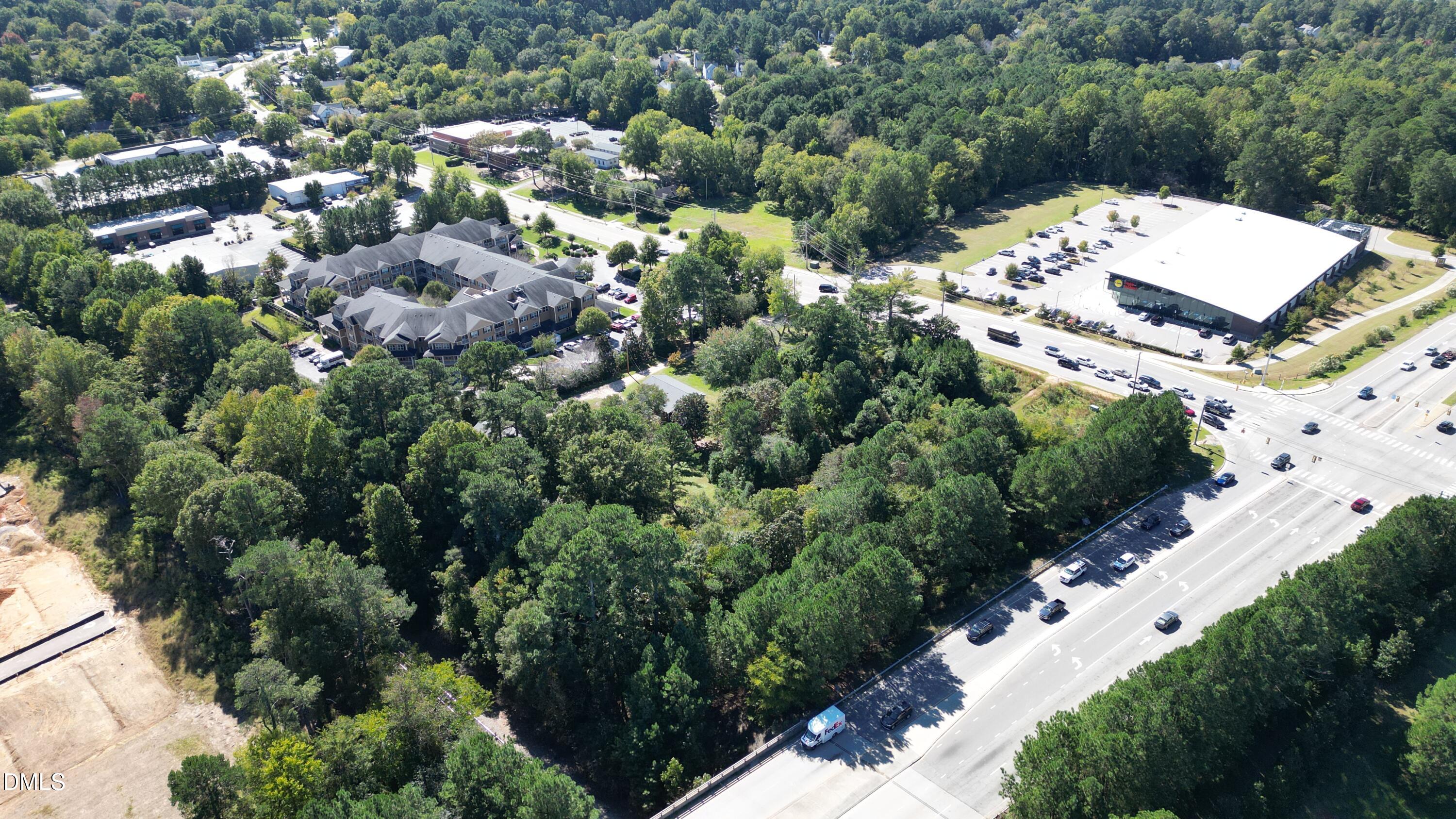 0 South Main Street Wake Forest, NC 27587 - Photo 8 of 11 an aerial view of a house with a yard