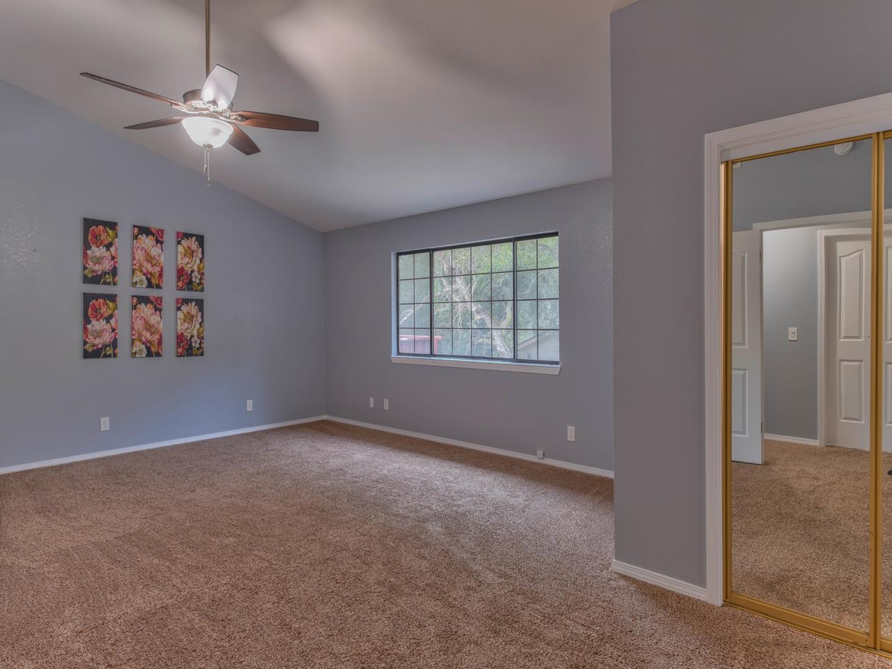 6640 Kim Ann Lane Salinas, CA 93907 - Photo 18 of 41 an empty room with windows and fan