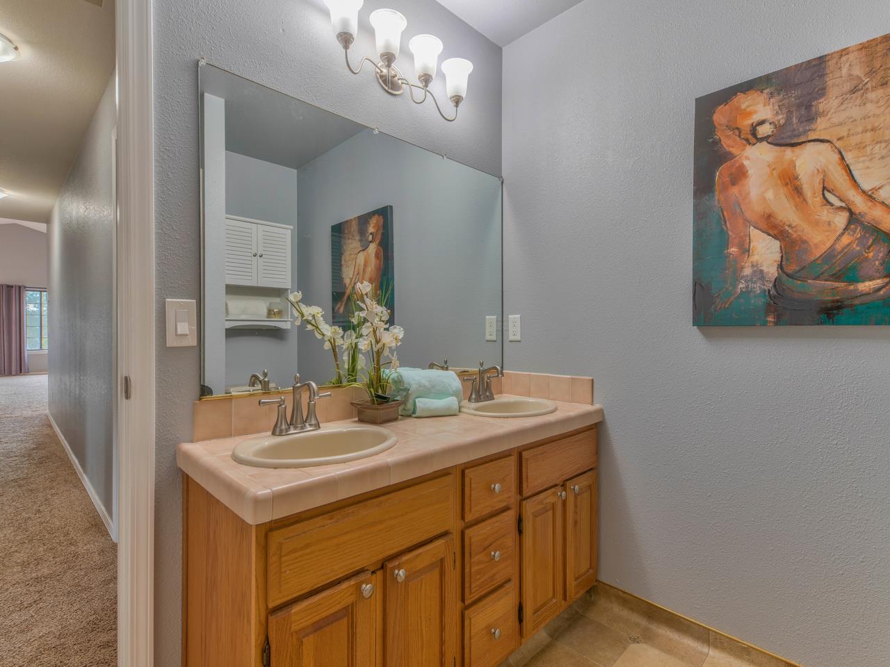 6640 Kim Ann Lane Salinas, CA 93907 - Photo 27 of 41 a bathroom with a sink and a mirror