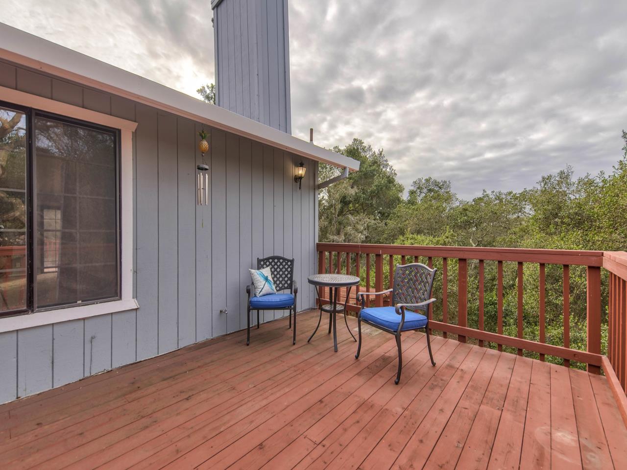 6640 Kim Ann Lane Salinas, CA 93907 - Photo 4 of 41 a balcony with wooden floor table and chairs