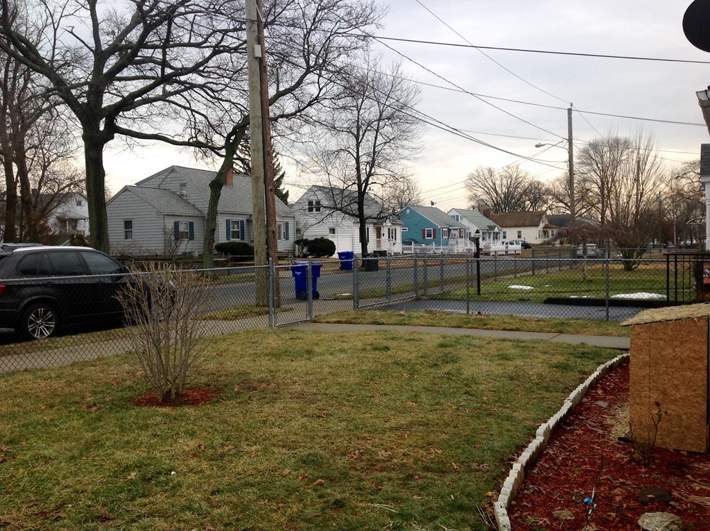 122 Redlands Street Springfield, MA 01104 - Photo 3 of 13 a view of a yard with a fountain