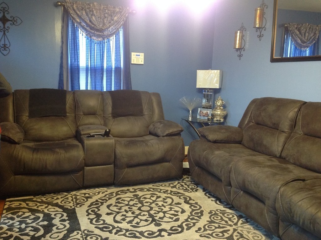 122 Redlands Street Springfield, MA 01104 - Photo 7 of 13 a living room with a couch and a window