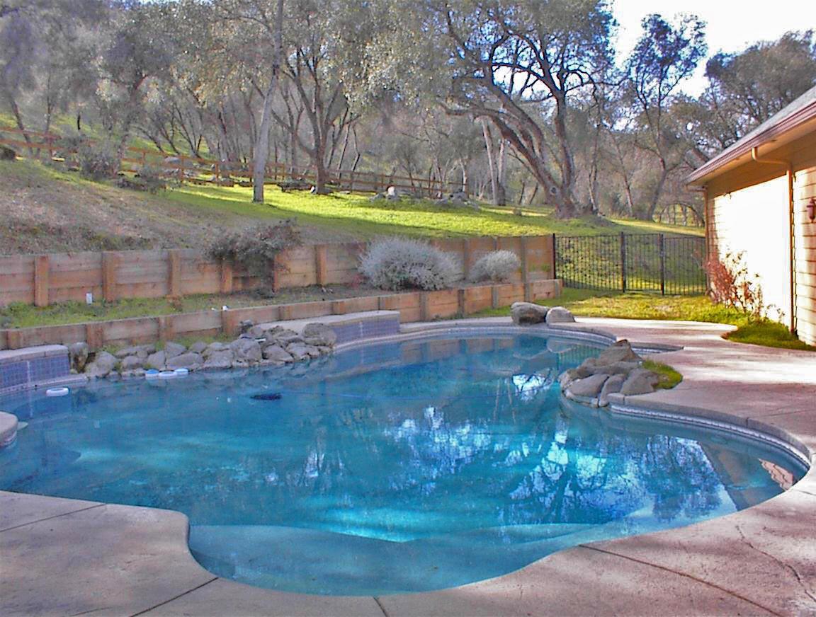 45483 Sand Creek Road Squaw Valley, CA 93675 - Photo 20 of 80 a view of a swimming pool with a yard